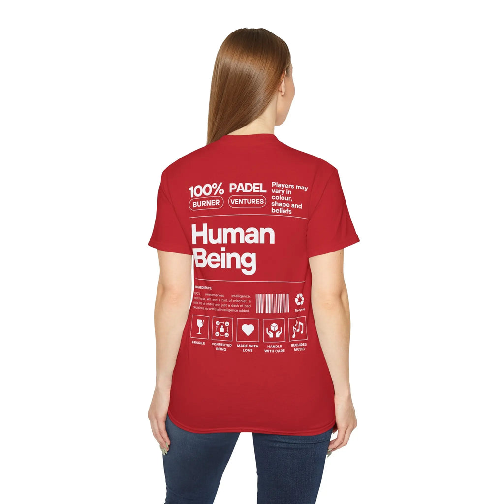 PSF Collective A woman with straight brown hair wears the Limited Edition "Human Being" Tee by Printify, featuring bold white text and icons like "100% Human Being" on the back. She faces away from the camera in her red t-shirt. Designed for the Unwind