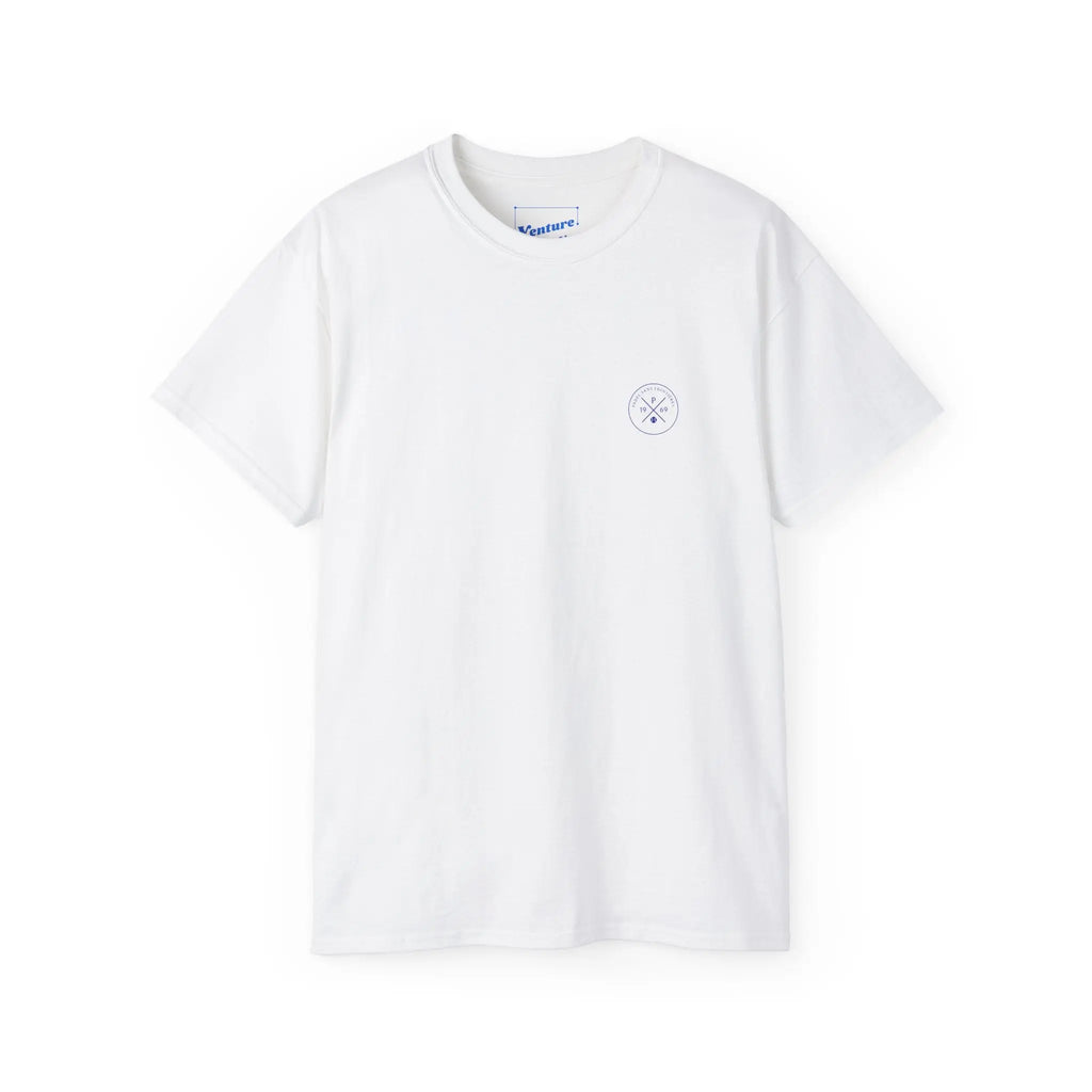PSF Collective The Printify Limited Edition - Padel in the Dust Tee is a plain white short-sleeve shirt with a small circular logo on the left chest, shown against a white background. Designed for the Unwind