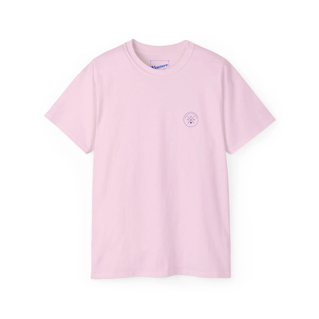 PSF Collective The Limited Edition - Padel in the Dust Tee by Printify is a light pink short-sleeve t-shirt with a small circular logo on the left chest, shown laid flat on a white background. Designed for the Unwind