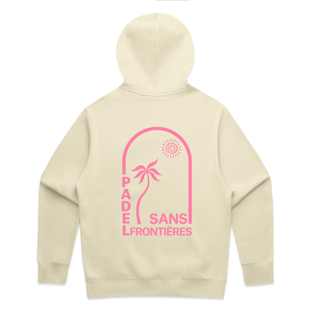 PSF Collective The Summer Arch in Pink Ladies Hoodie features a cream color, back design with pink palm tree, sun, and “PADEL SANS FRONTIÈRES” text in a rounded rectangle—ideal for women wanting cozy comfort and standout summer style. Designed for the Unwind