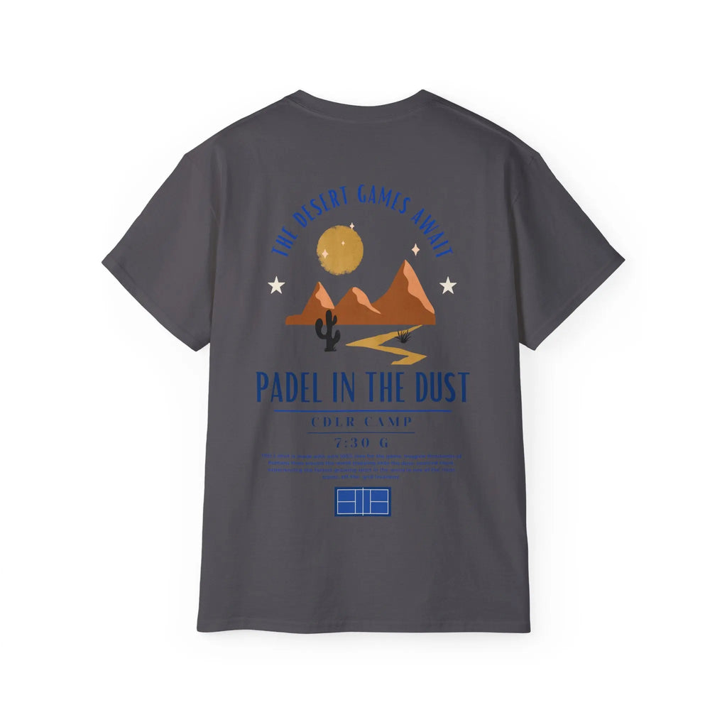 PSF Collective The Limited Edition - Padel in the Dust Tee by Printify features desert mountains, cactus, sun, stars, and a court graphic with "The Desert Games Await" text. Perfect for Patty Camps fans—your ultimate Burning Man padel shirt!. Designed for the Unwind