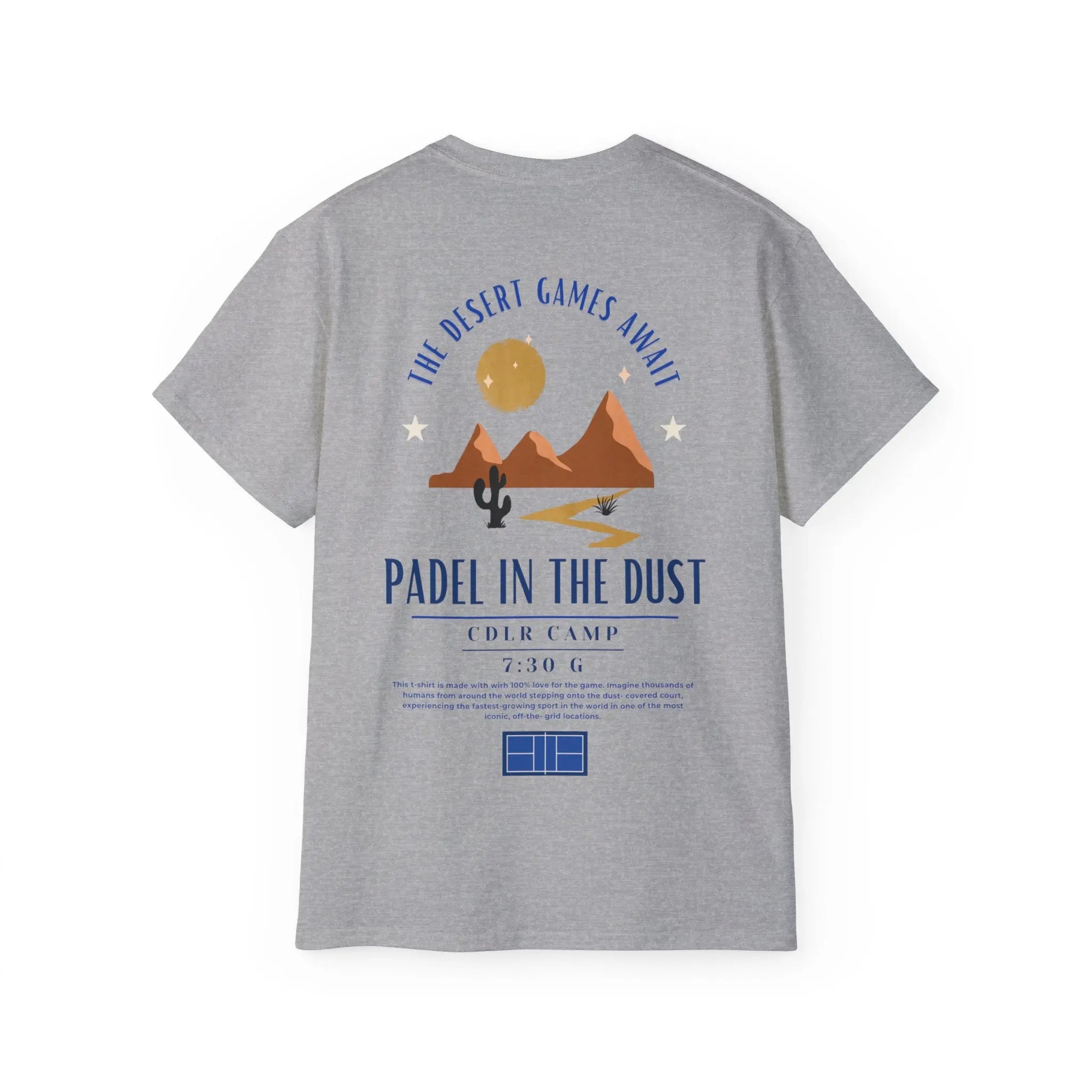 PSF Collective The Limited Edition - Padel in the Dust Tee by Printify features a gray design with a desert scene—mountains, cactus, sun—and the text "The Desert Games Await, Padel in the Dust, CDLR Camp." Perfect for Patty Camps or your next Burning Man event!. Designed for the Unwind