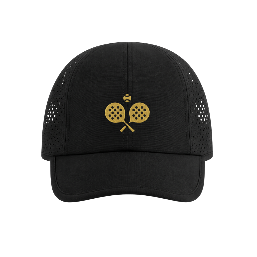 PSF Collective The PSF Structured On Court Active Cap is a black athletic cap with a gold embroidered icon of two crossed pickleball paddles topped by a pickleball, featuring laser-cut side ventilation and a solid curved brim. Designed for the Unwind
