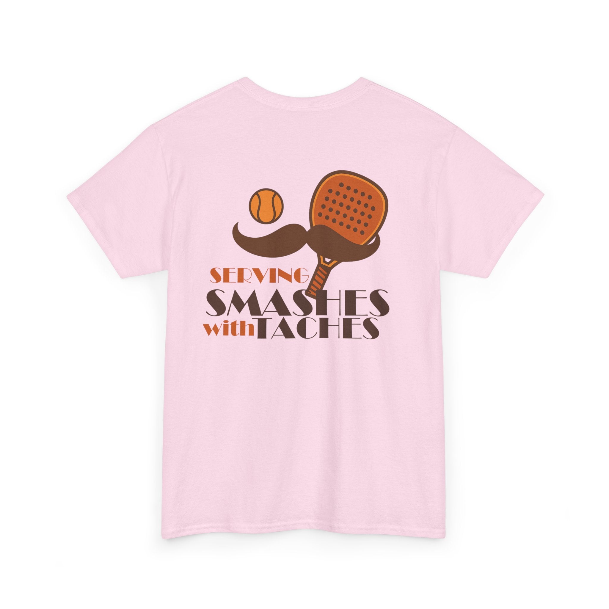 PSF Collective The Movember Serving Smashes with Taches Tee is a light pink shirt featuring a back graphic of a brown paddle with a mustache, an orange pickleball, and the phrase “Serving Smashes with Taches”—supporting men’s health awareness in style. Designed for the Unwind