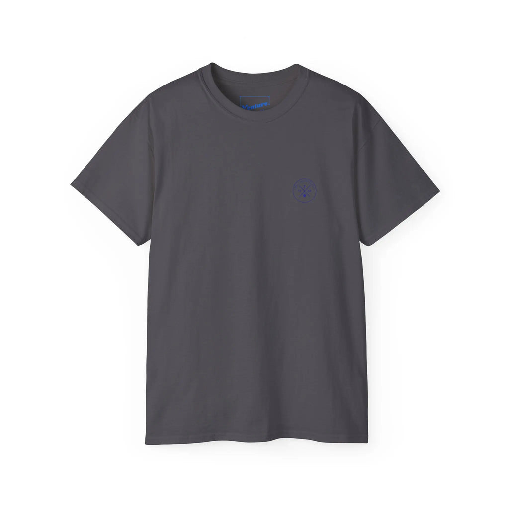 PSF Collective The Limited Edition - Padel in the Dust Tee by Printify is a dark gray short-sleeve shirt featuring a subtle Patty Camps logo on the left chest, inspired by padel, shown on a white background. Designed for the Unwind