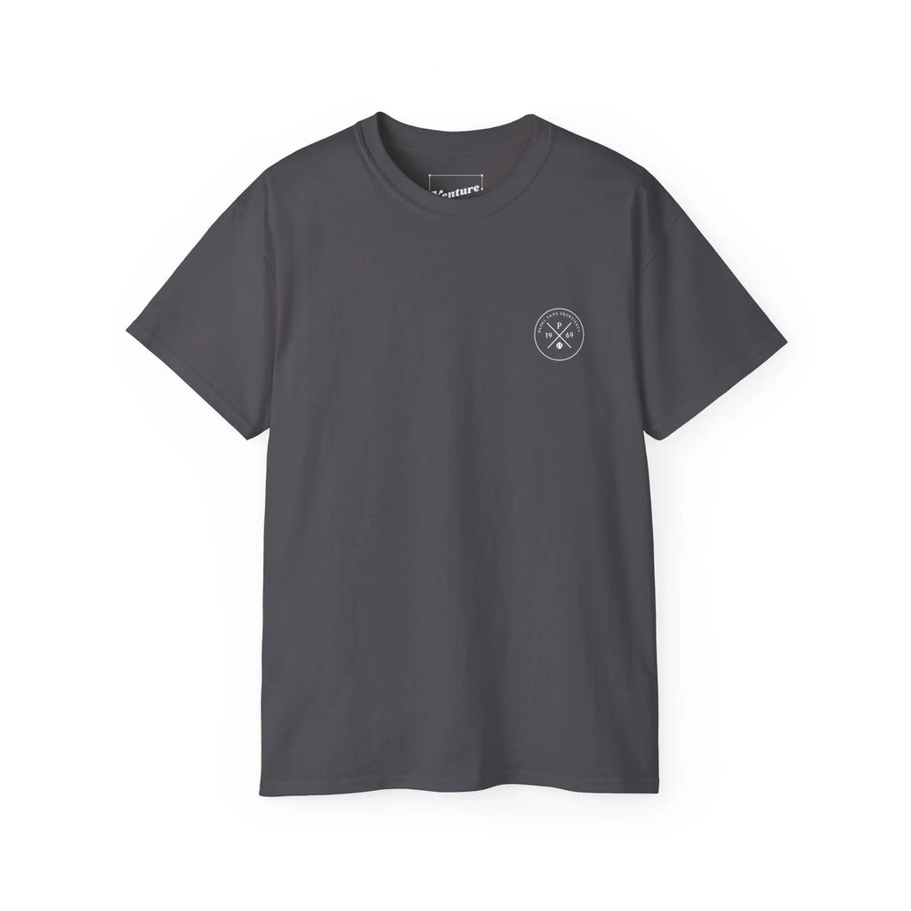PSF Collective The Limited Edition "Human Being" Tee by Printify is a plain dark gray short-sleeve shirt with a small white circular logo on the left chest, shown on a white background. Designed for the Unwind
