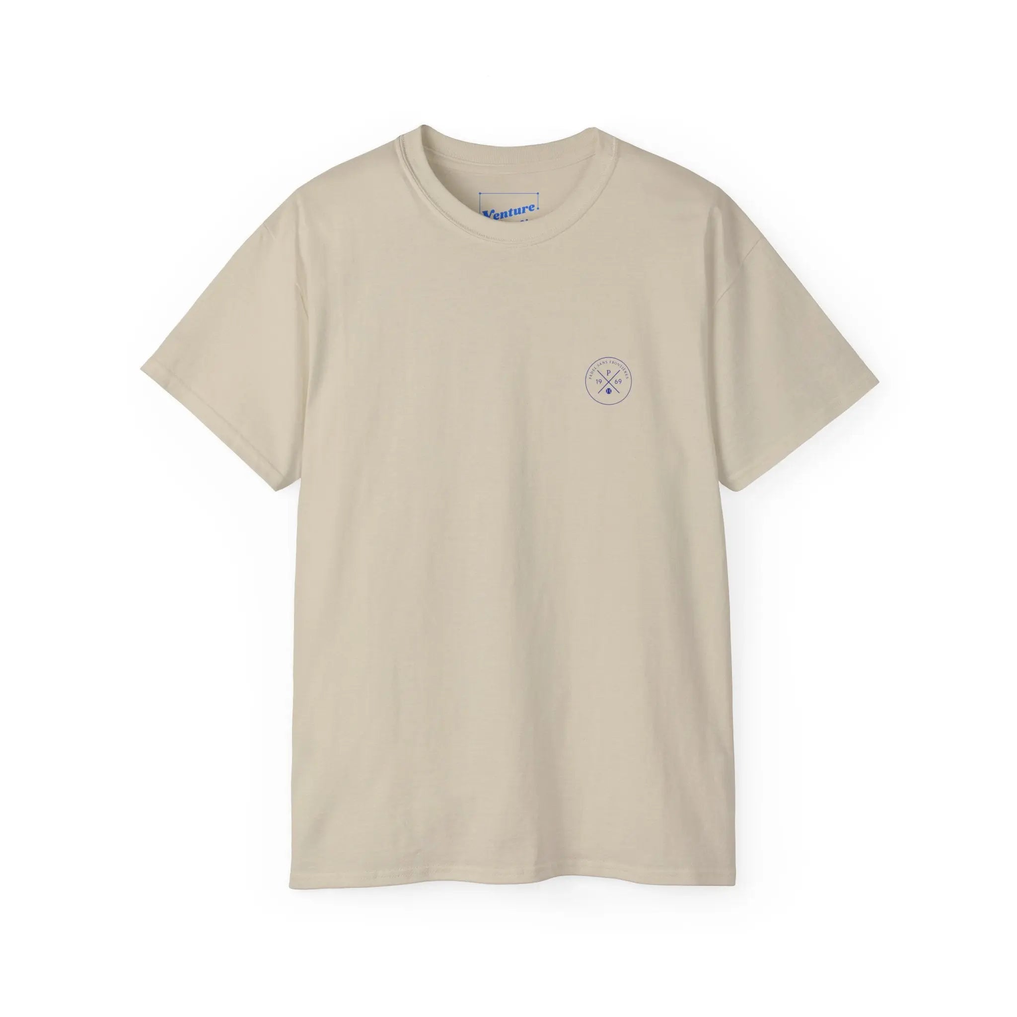 PSF Collective The Limited Edition - Padel in the Dust Tee by Printify, in light beige, features a small round chest logo—ideal for fans of Patty Camps and Burning Man padel style. Displayed on a white background. Designed for the Unwind
