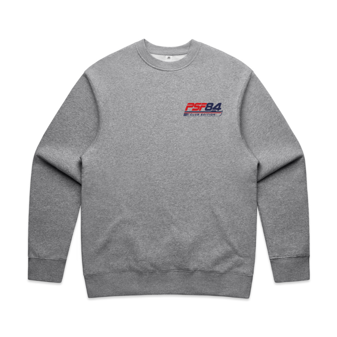 PSF Collective The Padel '84 Sweatshirt is a plain gray padel sweatshirt with "PSF84 PLAY SET FOUR" printed in blue and red on the left chest. It features long sleeves, along with a ribbed collar, cuffs, and hem for a classic vintage sportswear appearance. The front is free from any additional designs or graphics. Designed for the Unwind