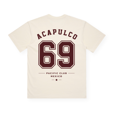 PSF Collective Introducing the Acapulco ’69 Box Tee: an eco-friendly, cream-colored premium T-shirt designed with a clean, sporty aesthetic. On the back, bold maroon “ACAPULCO” lettering sits above a large “69,” while “PACIFIC CLUB MEXICO” and a small star complete the look below. Drawing inspiration from padel Acapulco 1969, this statement tee blends retro vibes with sustainable style. Designed for the Unwind