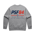 PSF Collective The Padel '84 Sweatshirt features a gray crewneck design with a bold navy blue PSF84, a striking red 84, and a baseball icon on the back. Below these details, CLUB EDITION appears above a red line, with EST. 1984 – MARBELLA, SPAIN printed underneath in smaller blue text. Inspired by vintage sportswear, this sweatshirt combines classic style with sporty padel flair. Designed for the Unwind
