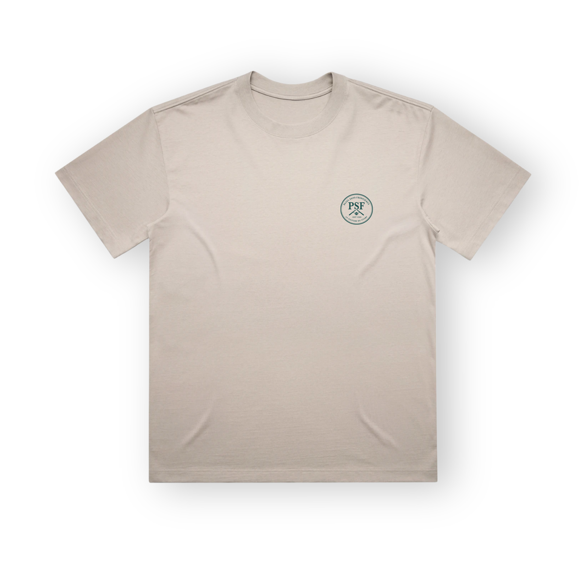 PSF Collective The Green Ink Box Tee is a beige short-sleeved crew-neck premium cotton tee centered on a white background, featuring a small circular green International Padel Club logo with the text PSF above a line drawing of a house on the left chest. Designed for the Unwind