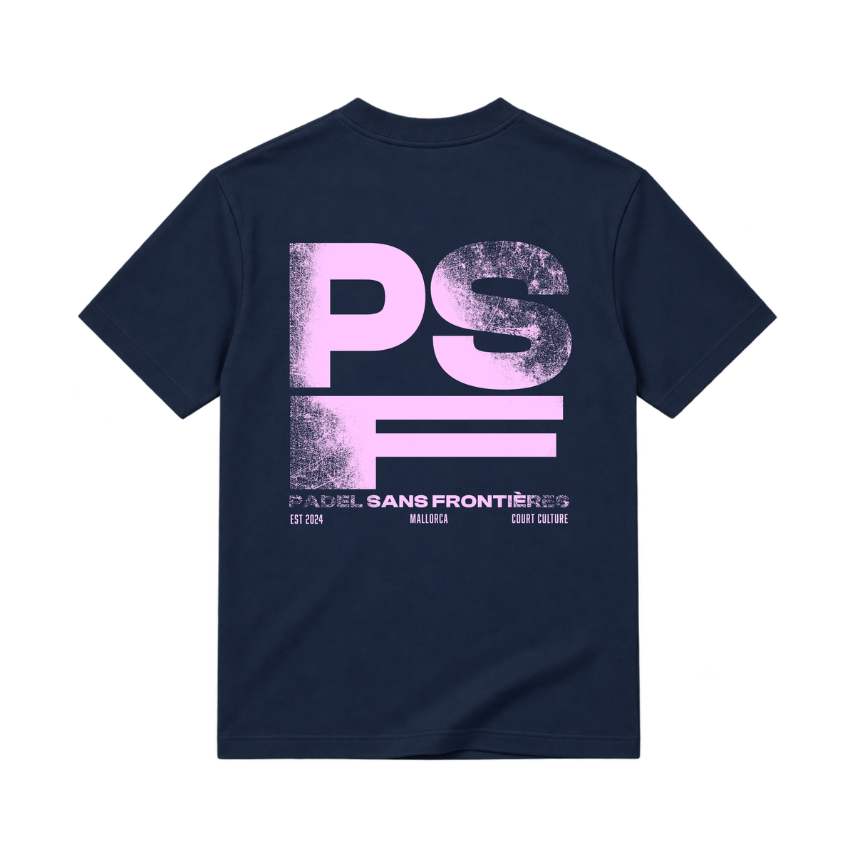 PSF Collective Back view of the navy blue short-sleeved PSF-116 Padel T-shirt, featuring a large, distressed light pink graphic on the center back reading PS over F, with PADEL SANS FRONTIÈRES, EST 2024, MALLORCA, and COURT CULTURE printed underneath. Designed for the Unwind