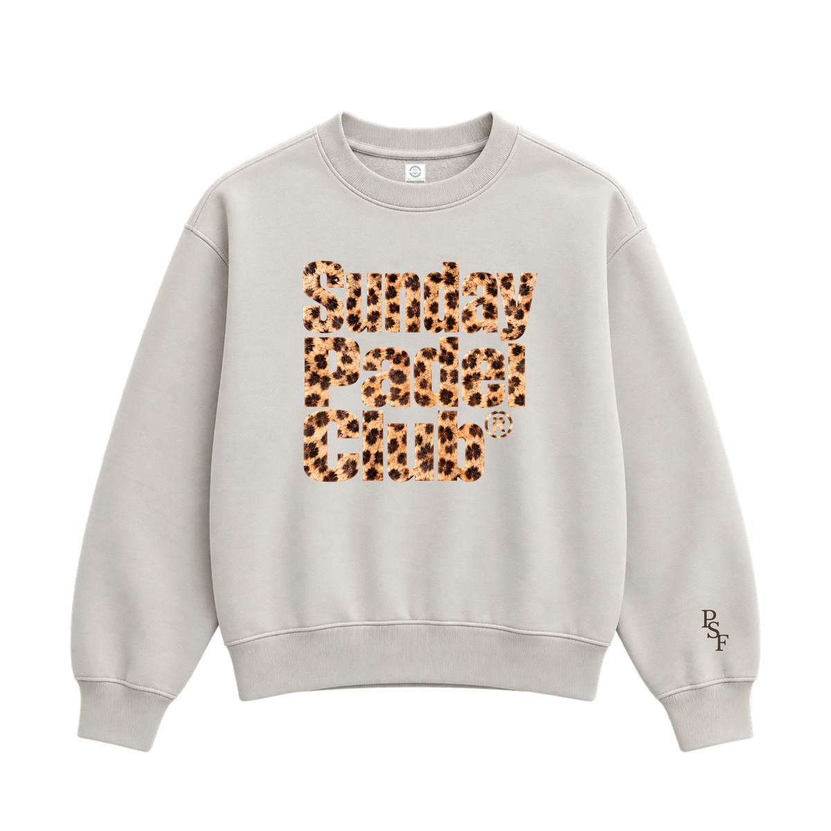 PSF Collective A beige PSF-128 crewneck sweatshirt features the words Sunday Padel Club in a leopard print pattern across the chest, with PSF embroidered in dark brown near the left cuff. Designed for the Unwind
