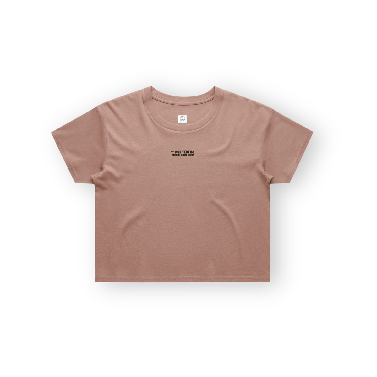 PSF Collective A dusty rose, short-sleeved cropped PSF-131 t-shirt for padel is laid flat against a white background, featuring black text that reads SANS FRONTIÈRES PADEL. JSG. printed upside down on the chest and a small circular label inside the back neckline. Designed for the Unwind