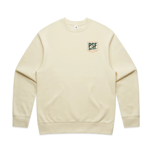 PSF Collective The Court Culture by PSF Unisex Sweatshirt is a butter-coloured crewneck with a minimal design, featuring a small green and orange "PSF" patch with crossed paddles on the left chest. No other patterns or graphics are present. Designed for the Unwind