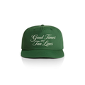 PSF Collective The Good Times and Tan Lines Cap is a green summer hat with white cursive text, a structured fit, and a flat brim. It’s photographed on a white background with even lighting. Designed for the Unwind